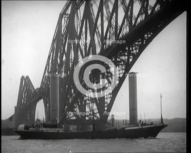 German Boat Passing Under the Forth Bridge in the United Kingdom, 1921. Creator: British Pathe Ltd.
