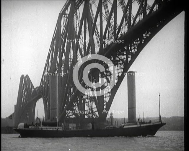 German Boat Passing Under the Forth Bridge in the United Kingdom, 1921. Creator: British Pathe Ltd.