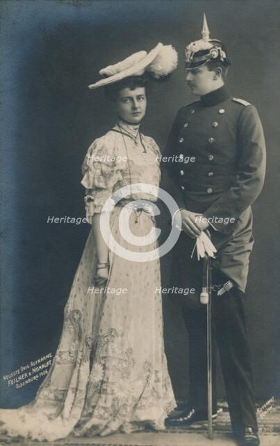 'German couple. With male in dress uniform', 1906. Artist: Unknown.