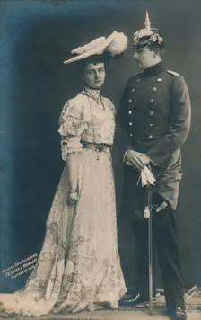 German couple. With male in dress uniform 1906