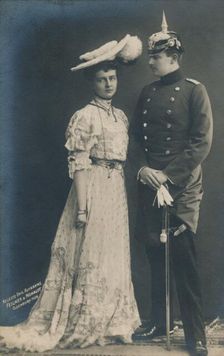 German couple. With male in dress uniform 1906