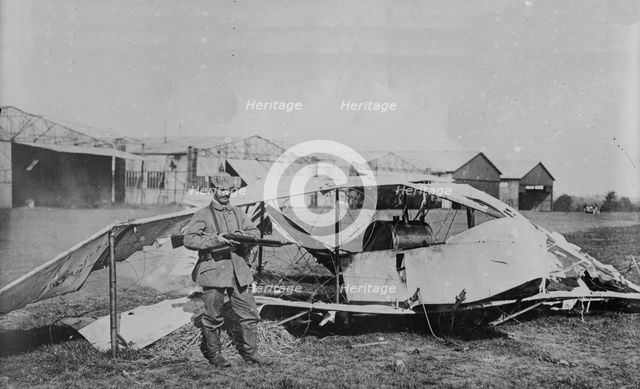 German guarding wrecked aeroplane, between 1914 and c1915. Creator: Bain News Service.