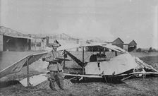 German guarding wrecked aeroplane, between 1914 and c1915. Creator: Bain News Service