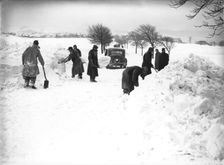 German/Italian prisoners of war clearing snow on Fairfield Common, Buxton, Derbyshire, 1947. Creator: JD Meddins
