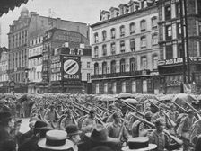 German infantry entering Brussels in the rain 1914