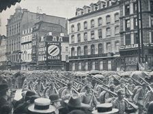 German Infantry entering Brussels in the rain, 1914