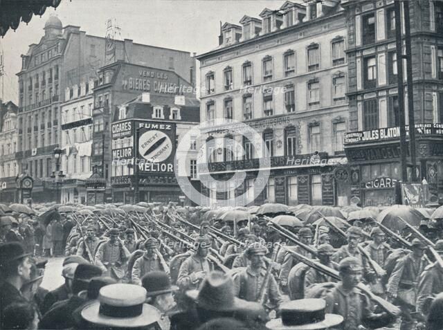 German Infantry entering Brussels in the rain, 1914. Artist: Unknown