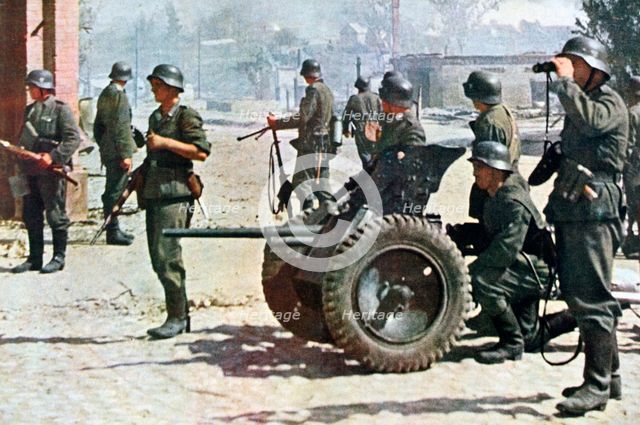 German infantrymen with light field artillery, Russia, 1943. Artist: Unknown