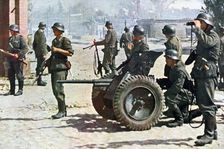 German infantrymen with light field artillery, Russia, 1943