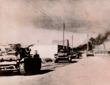 German panzers driving into Tebourba, Tunisia, 1942. Creator: Unknown