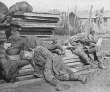German prisoners asleep after the battle at Plessis-de-Roye, Picardy, France, 30 March 1918