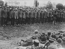 German prisoners lined up for examination, 8 Jun 1917. Creator: Bain News Service