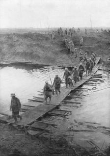 German prisoners on a duckboard track at the Yser Canal, Belgium, 31 July 1917