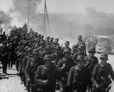 German Soldiers Marching Down a Road, 1941. Creator: British Pathe Ltd