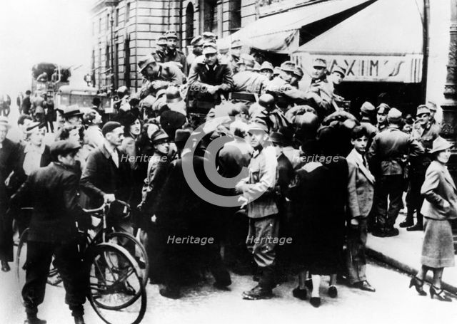German soldiers outside Maxim's restaurant, Paris, July 1940. Artist: Unknown