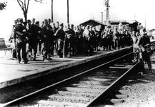 German soldiers on a railway platform awaiting transport, Paris, August 1940