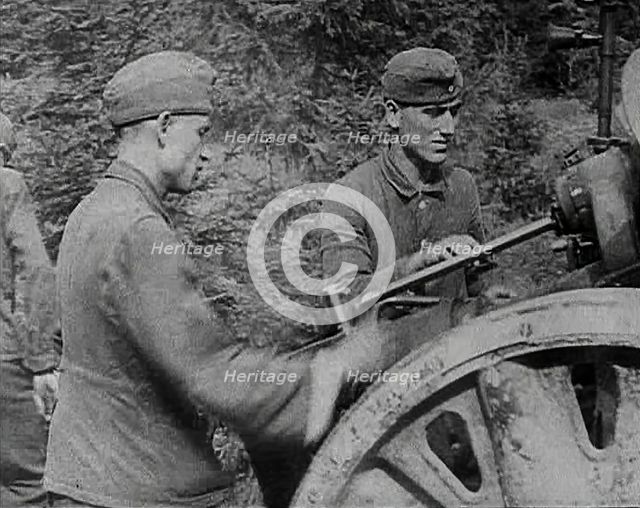 German Soldiers Operating an Artillery Gun, 1941. Creator: British Pathe Ltd.