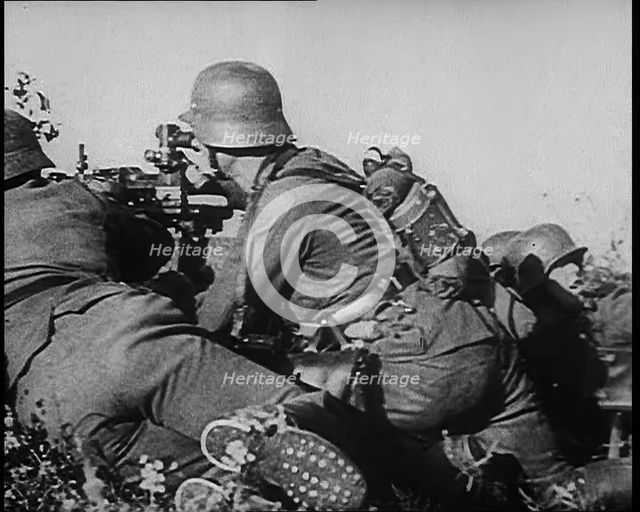 German Soldiers Firing from Cover at Dunkirk, 1940. Creator: British Pathe Ltd.