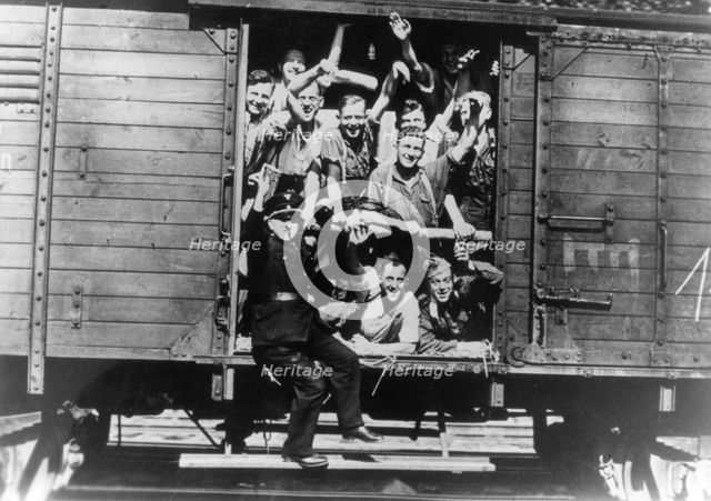 German soldiers in a railway wagon, France, August 1940. Artist: Unknown