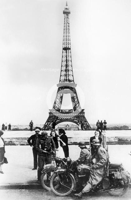 German soldiers in front of the Eiffel Tower, Paris, 1940. Artist: Unknown
