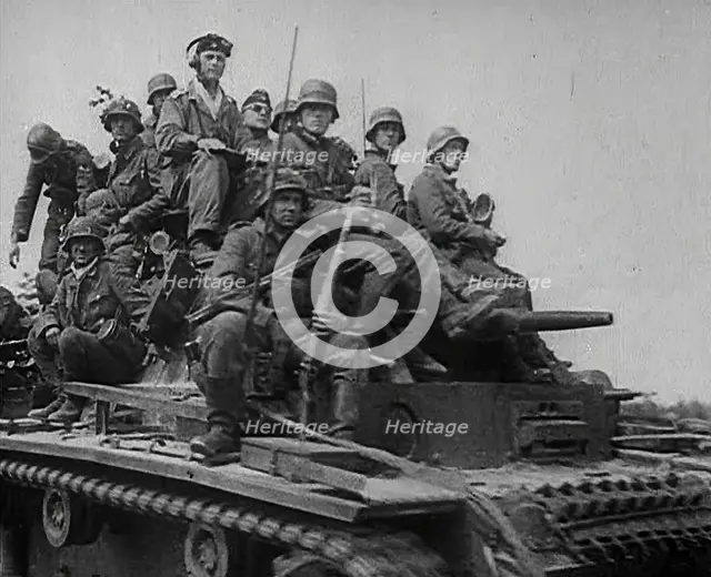 German Soldiers Riding Tanks, 1941. Creator: British Pathe Ltd.