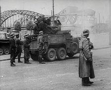 German Soldiers Standing Next to a Truck-Mounted Gun, 1942. Creator: British Pathe Ltd