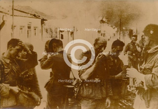 German troops take a break from the battle in Vitebsk, a city in Belarus, May 1944. Creator: Unknown.