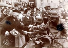 German troops are greeted by a crowed in Luknov, Czech Republic, c1939. Creator: Unknown