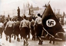 German troops enter Prague over the Charles Bridge, 15th March 1939. Creator: Unknown