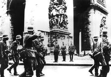German troops marching past the Arc de Triomphe, Paris, 14 June 1940