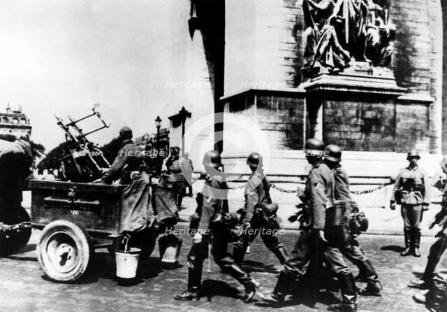 German troops marching past the Arc de Triomphe, Paris, June 1940. Artist: Unknown