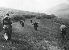 German troops surrendering to soldiers of the American 1st Army, near Elsborn, Germany, April 1945