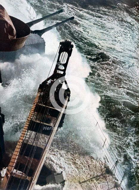 German warship battling the Atlantic seas, 1942. Artist: Unknown