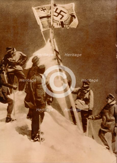 German Wehrmacht plant a Nazi flag on the summit of Mount Elbrus.  Creator: Unknown.
