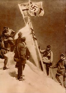 German Wehrmacht plant a Nazi flag on the summit of Mount Elbrus. Creator: Unknown