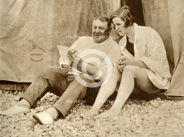 Gertrude Ederle receiving advice from her trainer Jabez Wolff, 1926, (1935). Creator: Unknown.