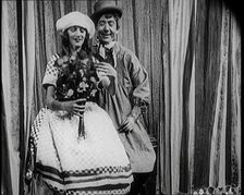 Gertrude Lawrence and Herbert Mundin Dressed as Country Types and Performing for the Camera, 1922. Creator: British Pathe Ltd