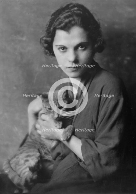 Gervais, Blanche, Miss, with Buzzer the cat, portrait photograph, 1916. Creator: Arnold Genthe.