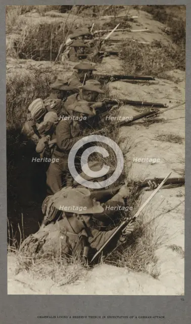 Gharwalis [sic] lining a reserve trench in expectation of a German attack, 1915 (1921). Creator: HD Girdwood.