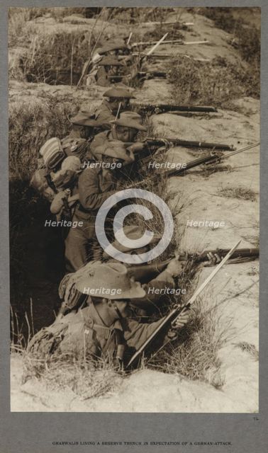 Gharwalis [sic] lining a reserve trench in expectation of a German attack, 1915 (1921). Creator: HD Girdwood.