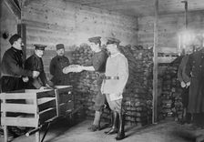 Giving Bread to British prisoners, between 1914 and c1915. Creator: Bain News Service