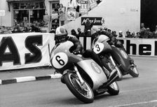 Giacomo Agostini on bike number 6, Tom Dickie on bike number 3, Isle of Man Junior TT, 1968