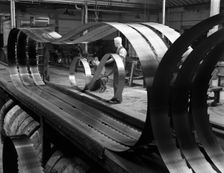 Giant bandsaw blades, Slack Sellers & Co, Sheffield, South Yorkshire, 1963. Artist: Michael Walters