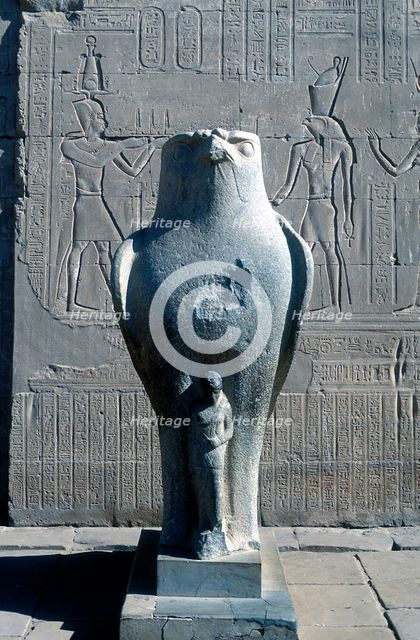 Giant statue of the Ancient Egyptian falcon-headed god Horus, Edfu, Egypt. Artist: Unknown