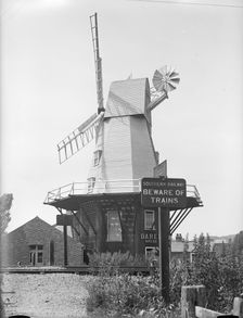 Gibbet smock mill from the opposite side of the Ashford and Hasting Railway line, East Sussex, 1934. Creator: HES Simmons