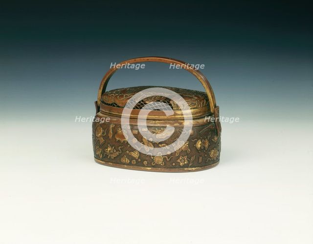 Gilded copper hand warmer, China, 1600-1650. Creator: Unknown.