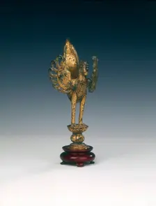 Gilt bronze bird on lotus applique, late Tang or Liao dynasty, China, 9th -10th century. Creator: Unknown