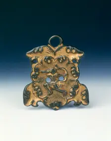 Gilt bronze horse fitting with archer on horseback, Tang dynasty, China, 8th century. Creator: Unknown
