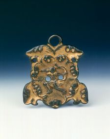 Gilt bronze horse fitting with archer on horseback, Tang dynasty, China, 8th century. Creator: Unknown