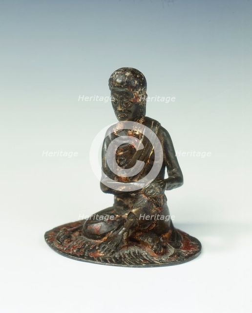 Gilt bronze statue of a lohan seated on a rush mat, late Ming dynasty, China, 1600-1644. Creator: Unknown.
